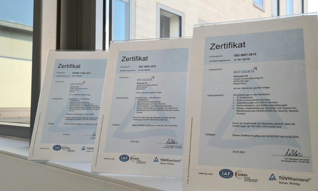 Die ISO-Zertifikate ISO 9001, ISO 14001 und ISO 27001. 